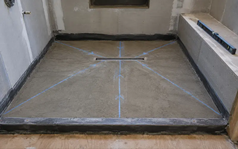 verify the floor has a genuine fall toward the drain